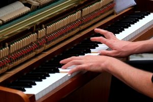 musician playing piano